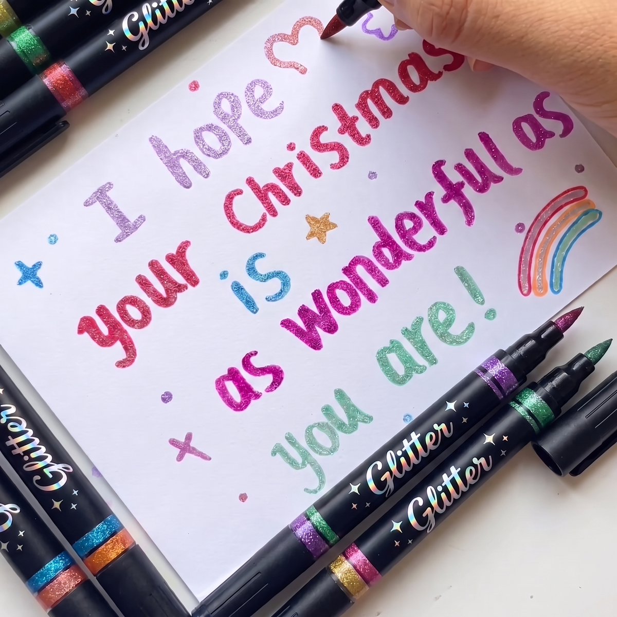 Christmas card lettered with glitter markers